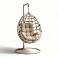 Hangstoel van wicker met kussen in beige voor binnen en buiten gebruik