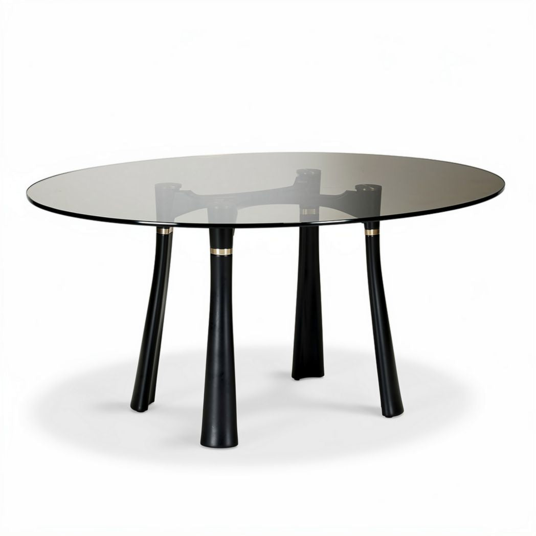 Ronde eetkamertafel van glas met zwarte houten poten 150 x 90 x 75cm